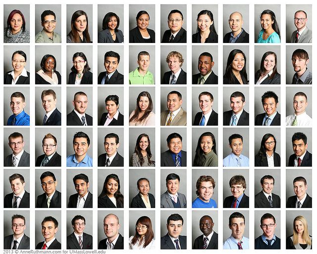 a group of people in suits and ties posing for a photo with different expressions on their faces