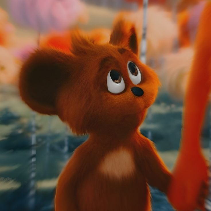 a cartoon bear with big eyes and an orange tail standing in front of other bears