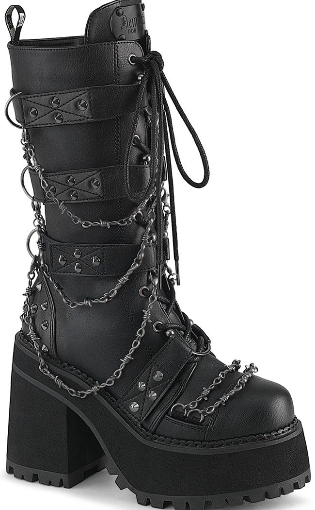 The ultimate biker boots! Covered in barbed wire chain decals and flanked with studs, these boots are a step up on yer regular punk kicks! Black PU Vegan 4 3/4 inch heel 2 1/4 inch platform Metal Cone Studded Hook-N-Loop Straps W/ Bull Ring Centers and Clip-On Hanging Barbed Wire Chain, D-Ring Details & Barbed Wire Chain Across the Toe, Inside Metal Zip Closure Mid Calf High Boots U.S women's sizing-refer to size chart for more info - these run smaller than the Shaker series if in doubt size up. Goth Black Boots, Gothic Shoes Heels, Goth Boots Aesthetic, Platfrom Boots, Spiky Boots, Alt Boots, Gothic Platform Boots, Knife Shoes, Platform Black Boots