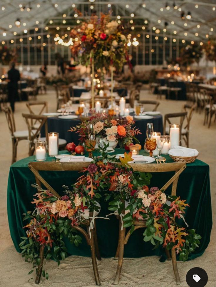 the green wedding shoes website is displayed on an iphone screen, with candles and flowers