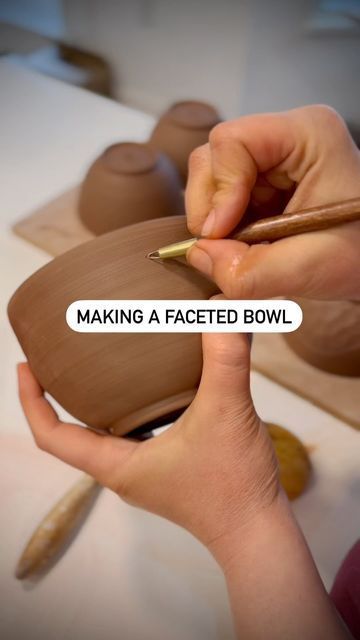 a person is making a faceted bowl with a wooden sticker on the side