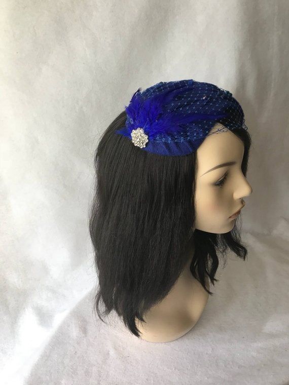 This is a classy Royal Blue wool felt half hat with a modern touch perfect as a fascinator hat, wedding hat, tea party hat, church hat or any other formal special occasion. This is a Royal Blue felt headpiece create by hand and has a wire base that can fit any head size comfortably. WHAT MAKES THIS SO UNIQUE I form each piece while on my head to see how it fits and looks and then take it off and hand sew each piece. I design it to wear both ways so there's no front or back. Light-weight and cool Blue Formal Winter Hat, Formal Blue Winter Hat, Blue Headband Hat For Kentucky Derby, Blue Adjustable Costume Hats With Short Brim, Adjustable Blue Headband For Kentucky Derby, Elegant Flat Cap For Party, Fitted Blue Flat Cap, Royal Blue Fitted Fascinator Hat, Blue Hat-shaped Headpiece For Party