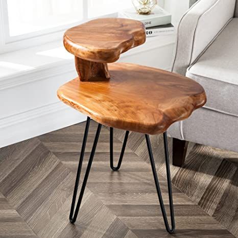 a wooden table with hairpin legs in a living room