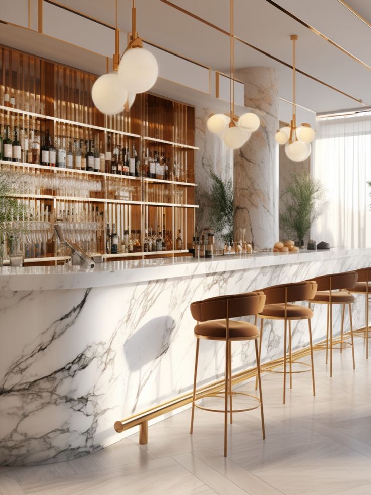 a bar with marble counter tops and gold barstools