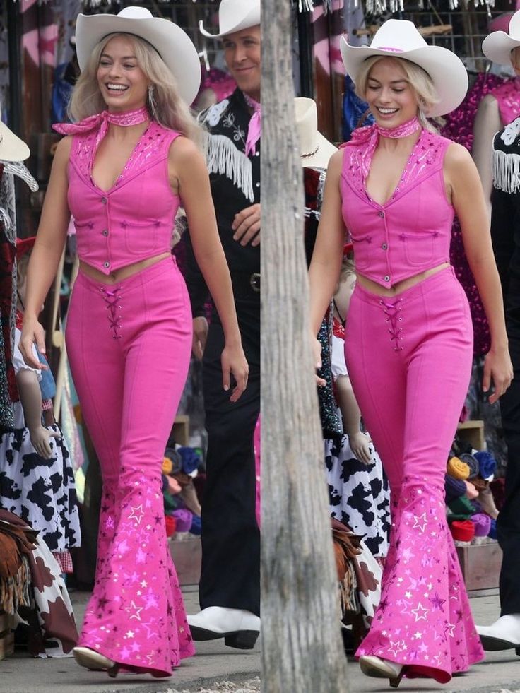 two women in pink outfits and cowboy hats