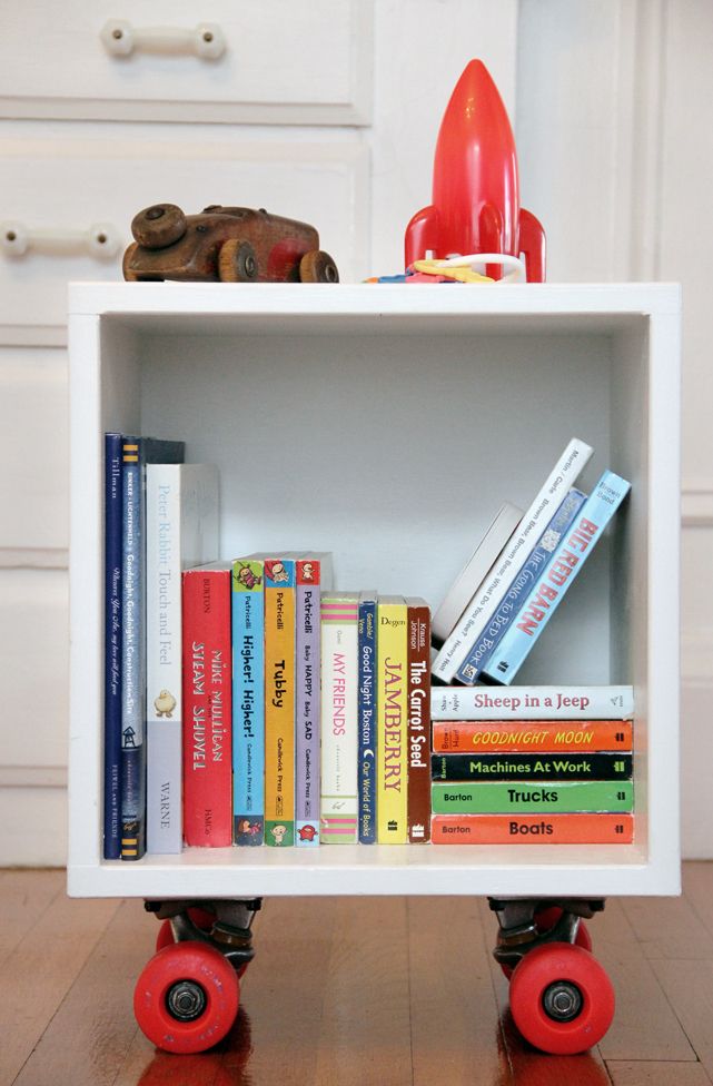 a white book shelf with books on it