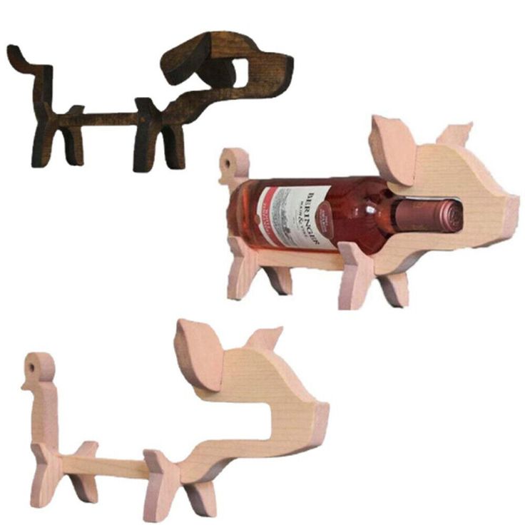 two wooden animals with wine bottles in them