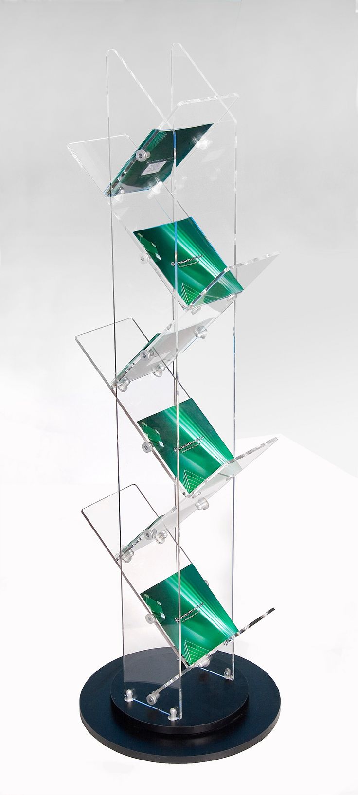 an acrylic display case with four shelves