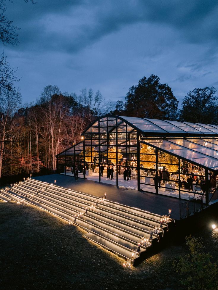 an outdoor concert venue lit up at night