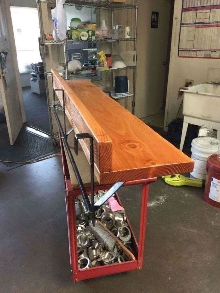 a workbench with tools on it in a garage