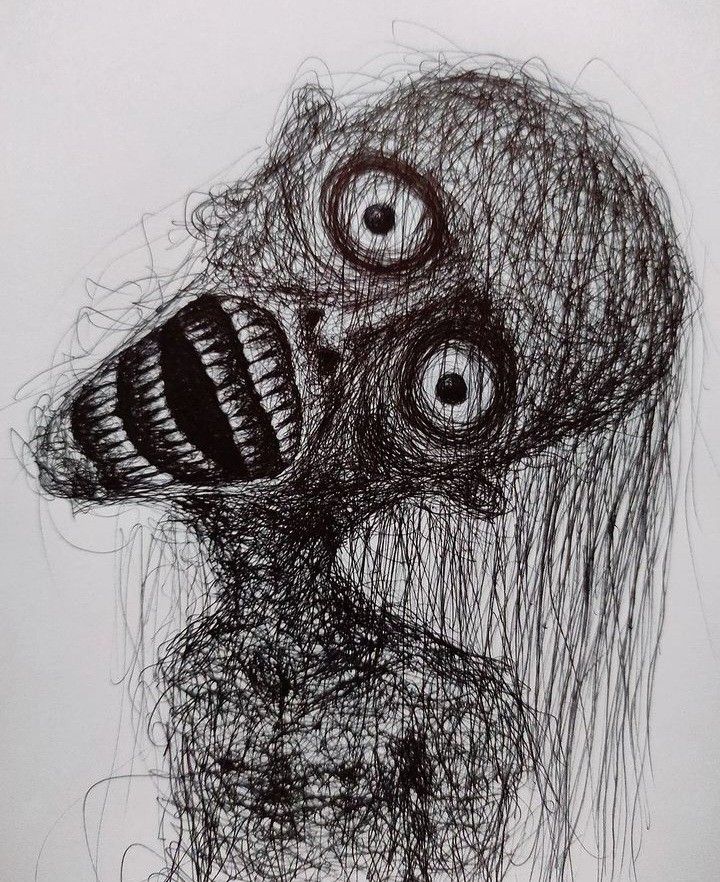 a drawing of an alien head with two eyes