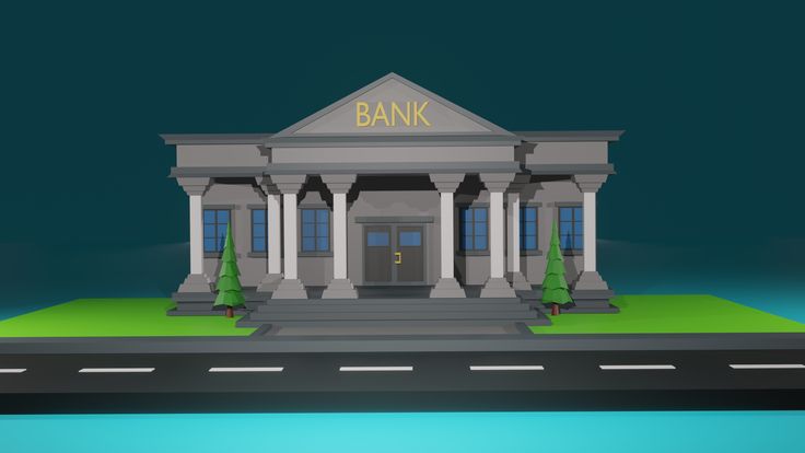 a bank building sitting on top of a green field