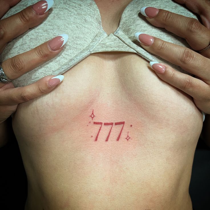 777 tattoo chest tattoo red ink 777 Spine Tattoo, 777 Tattoo On Chest, 777 Chest Tattoo Female, 777 Tattoo Collar Bone, 777 Tattoo Aesthetic, 777 Tattoo Placement, 777 Chest Tattoo, 444 Chest Tattoo, Red 777 Tattoo