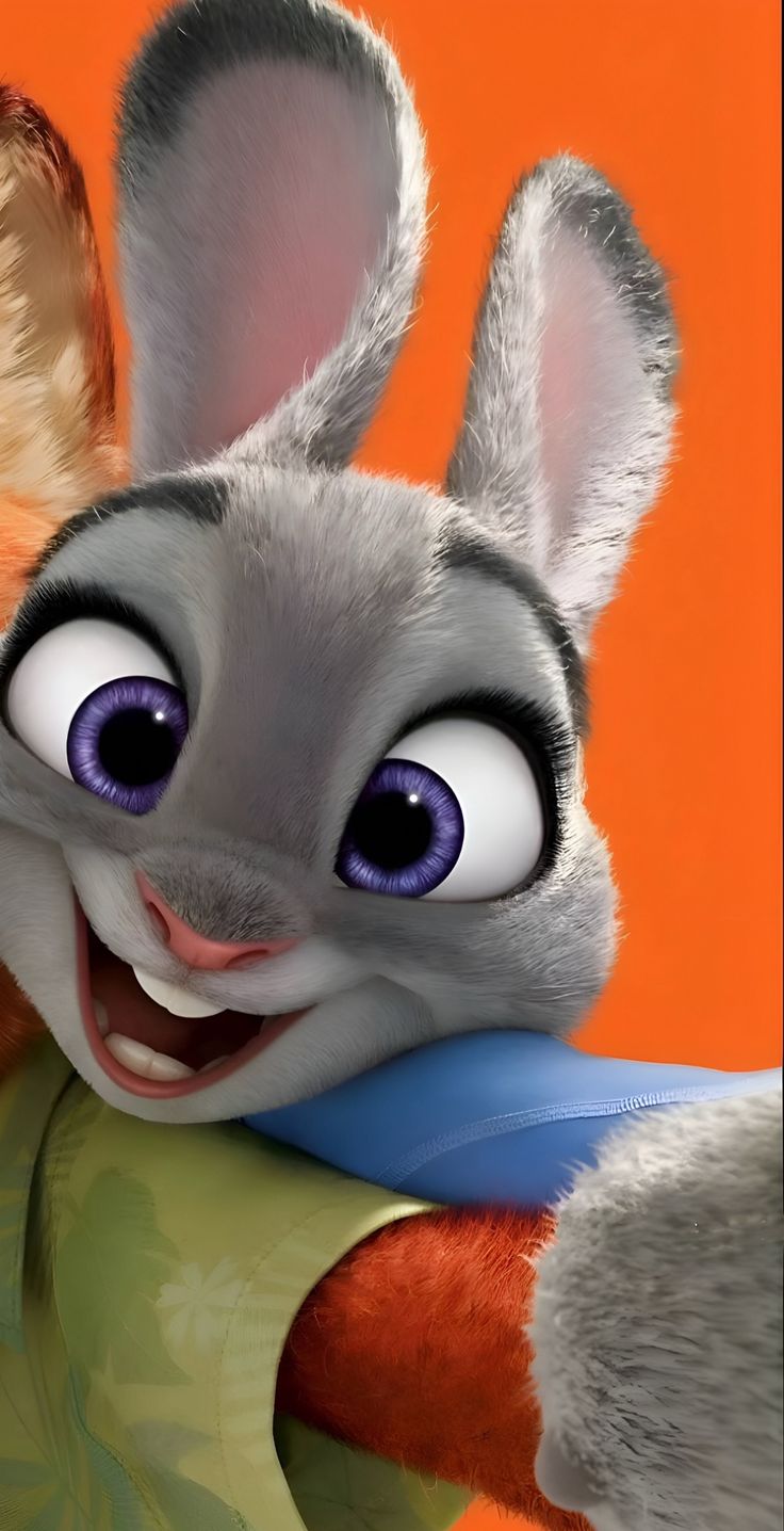 an animated rabbit with big blue eyes and large ears is smiling at the camera while wearing a green shirt