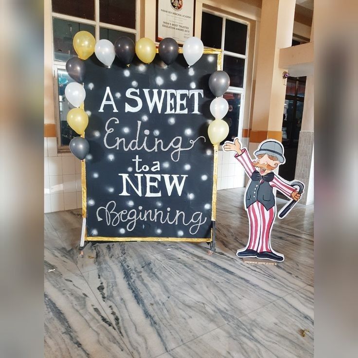 a sign that says asweet ending is new beginning with balloons and an image of a clown