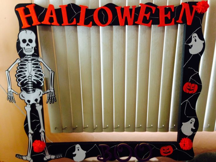 a halloween frame with a skeleton on it