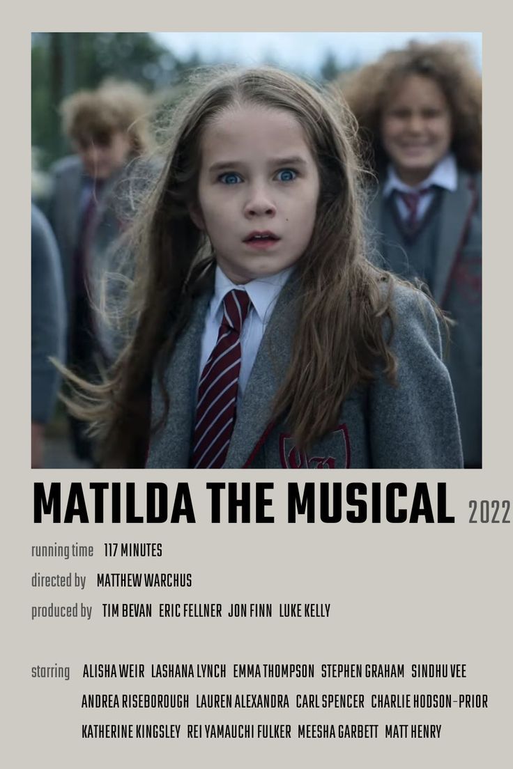 the poster for matilda the musical is shown in front of a group of young people