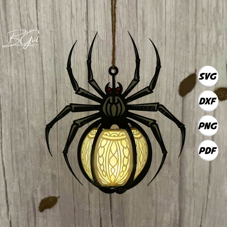 a spider lamp hanging from a wooden wall with the words svg df png