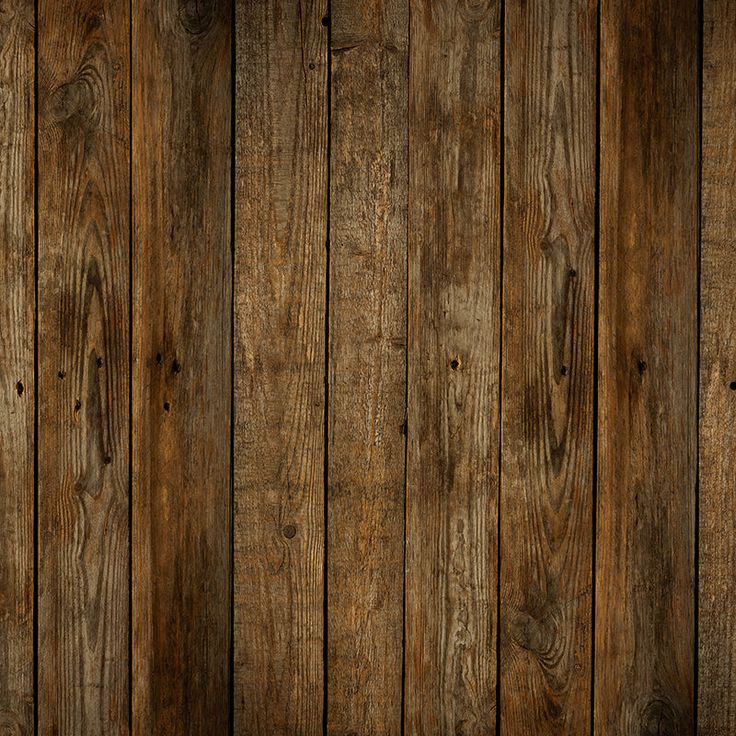 an old wooden wall with planks in the middle and brown paint on it's sides