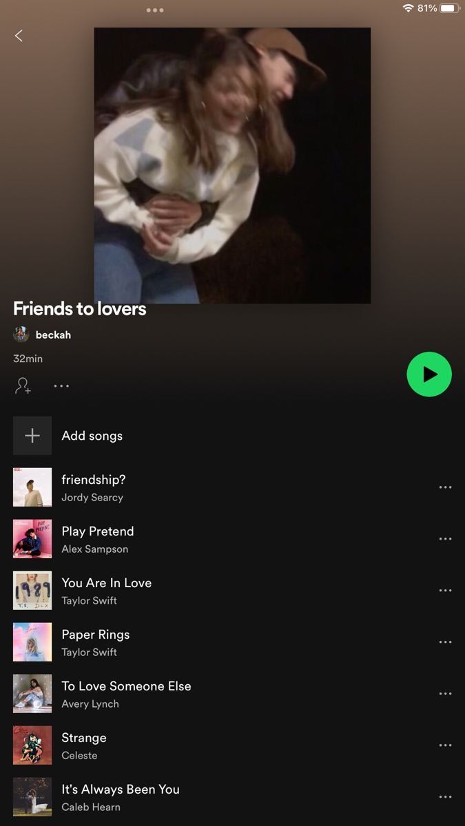 an iphone screen showing the music player's playlist for friends to lovers