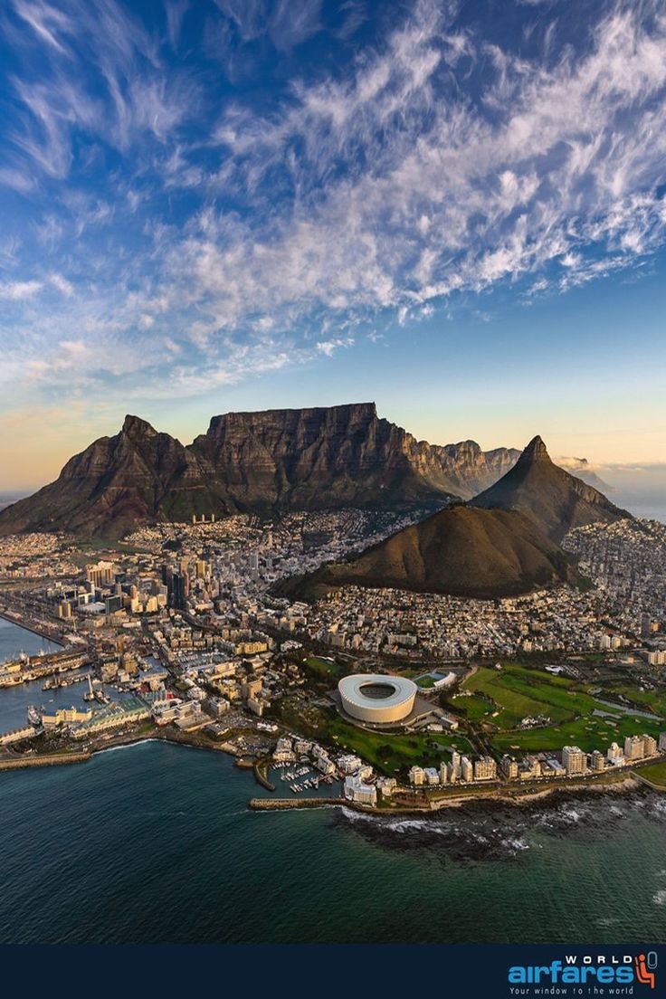 an aerial view of cape town with table mountain in the background