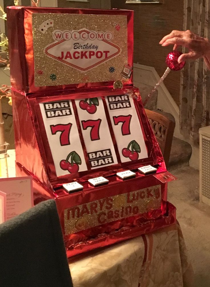 a slot machine that has been decorated with red and gold foil for the jackpot game