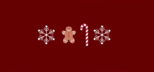 a red background with white snowflakes and candy canes in the shape of a gingerbread man