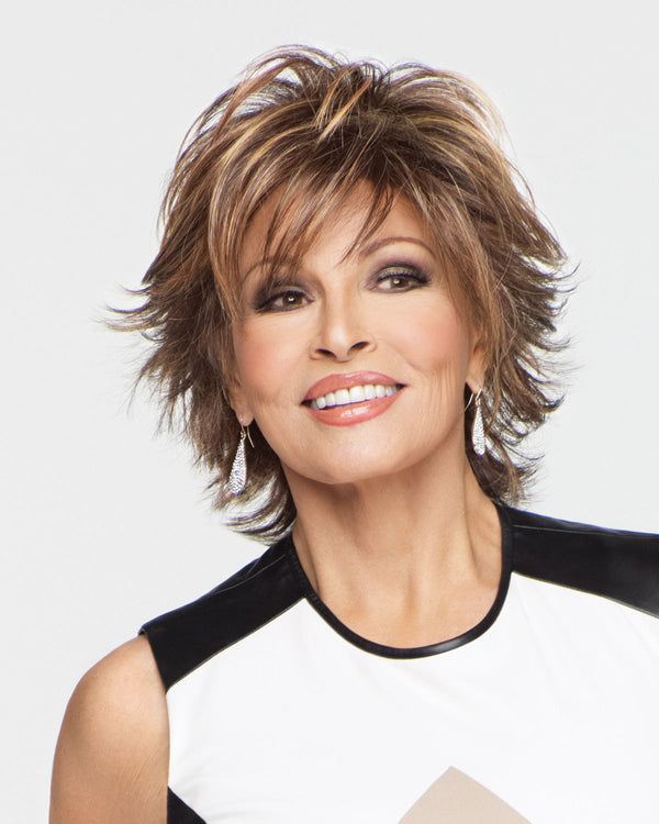 Loaded with layers, this mid-length shag adds fashion excitement with flipped textured ends throughout. A quick shake right out of the box and this cool, comfortable cut is ready-to-wear! Short Blonde Pixie Cut, Chemo Wig, Wilshire Wigs, Raquel Welch Wigs, Best Wig Outlet, Retro Hair, Best Wigs, Raquel Welch, 80s Retro