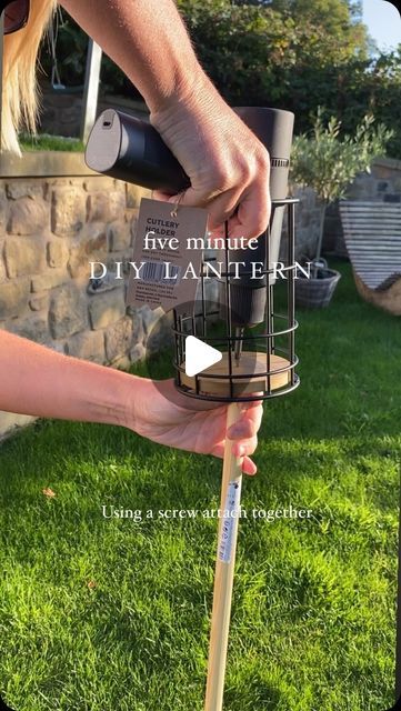 a person is holding a metal object in their hand and it says five minute diy planter