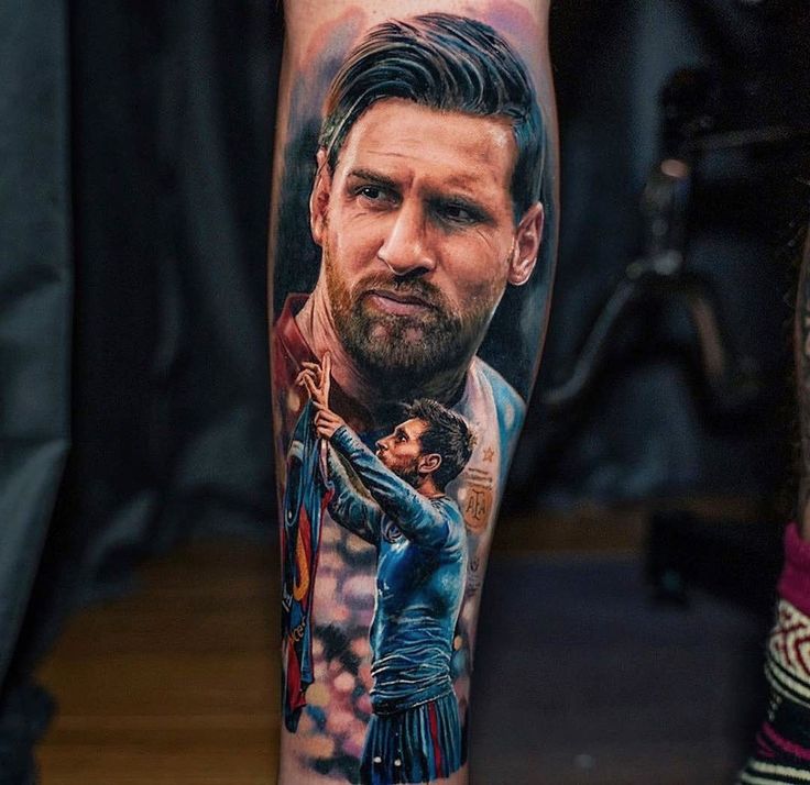 a man's leg with a portrait of himself on it