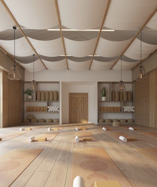 an empty room with wooden floors and shelves