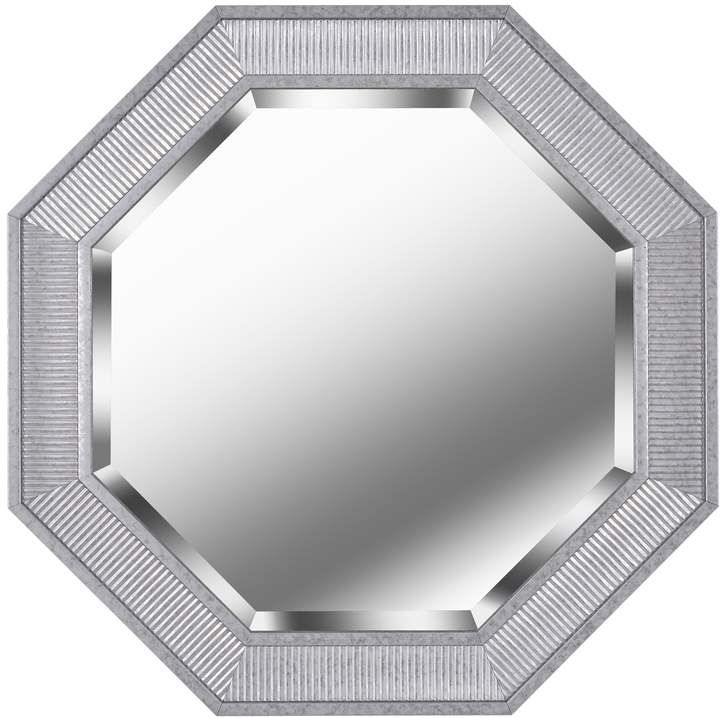 an octagonal mirror with silver trim around the edges