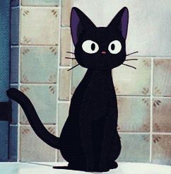 a black cat sitting on top of a bath tub next to a tiled wall and floor