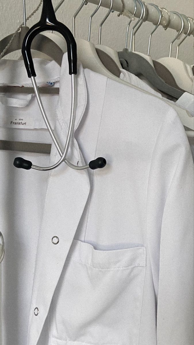 a white suit with a stethoscope hanging on it