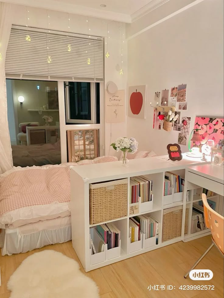 a bedroom with a bed, desk and bookshelf