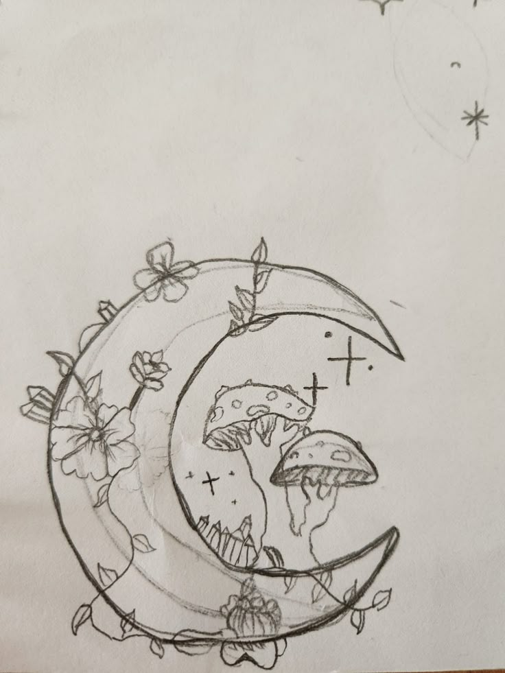 a drawing of the moon with flowers on it