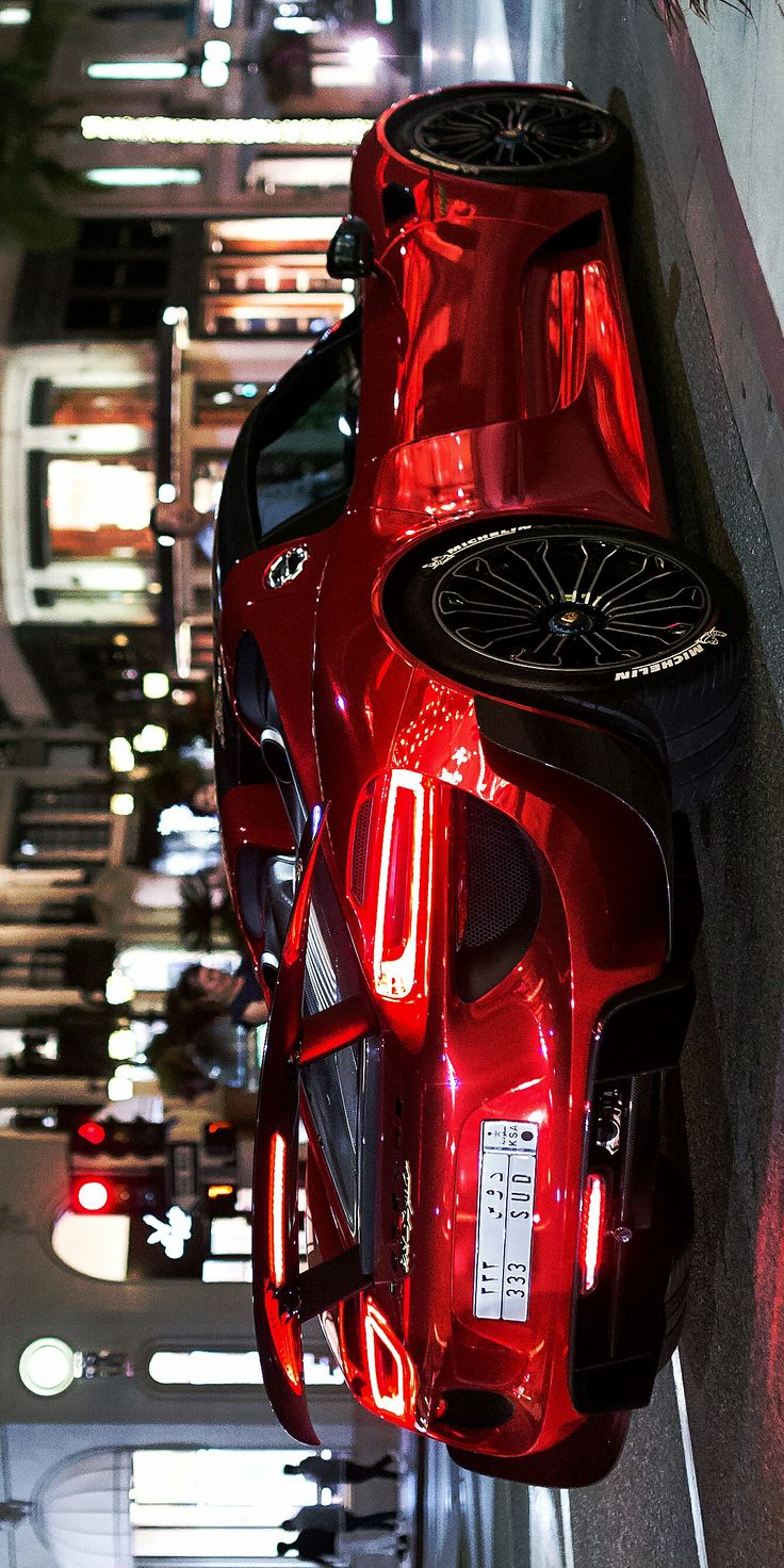 the back end of a red sports car