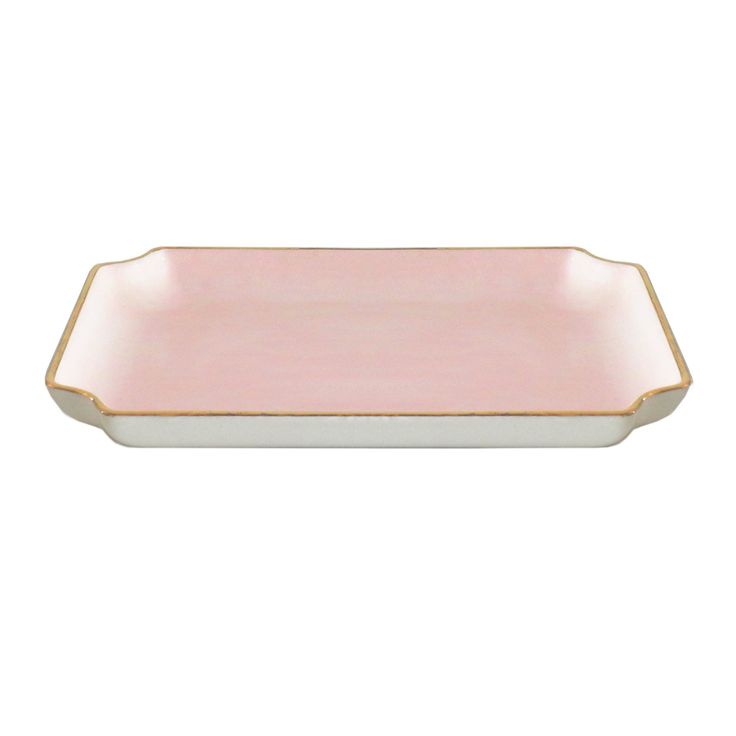 a pink and white tray with gold trim on the edge, against a white background