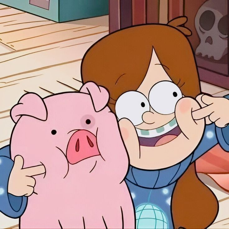 a woman holding a pink pig in her right hand and pointing to it's face