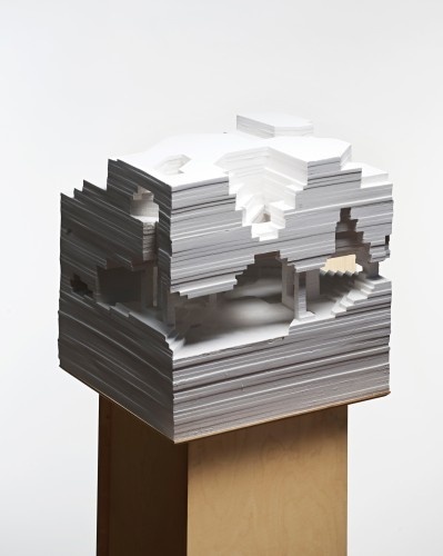 stacks of papers stacked on top of each other