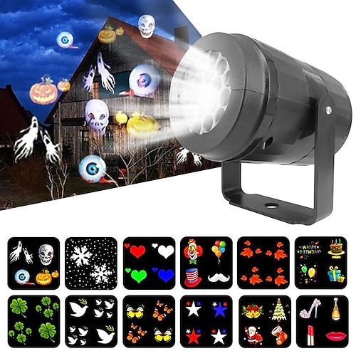 a projector light with halloween images on it and the image is projected in different colors