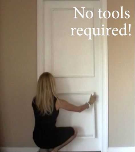 a woman kneeling in front of a door with the words no tools required on it