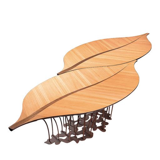 an artistic sculpture made out of wooden planks with metal rods on each side and two large leaf shaped sections at the top