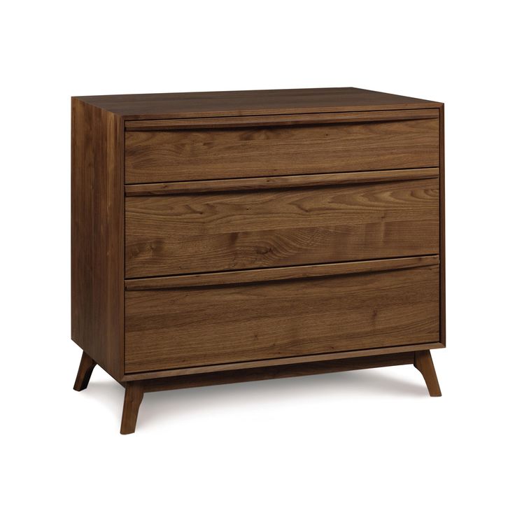 a wooden dresser with three drawers and two legs