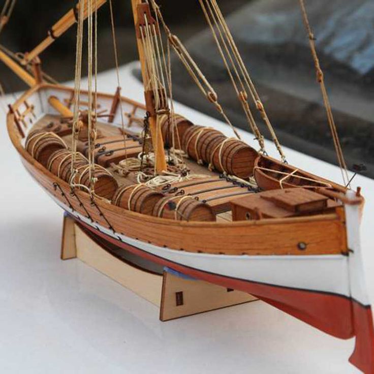 a model sailboat on display at a museum