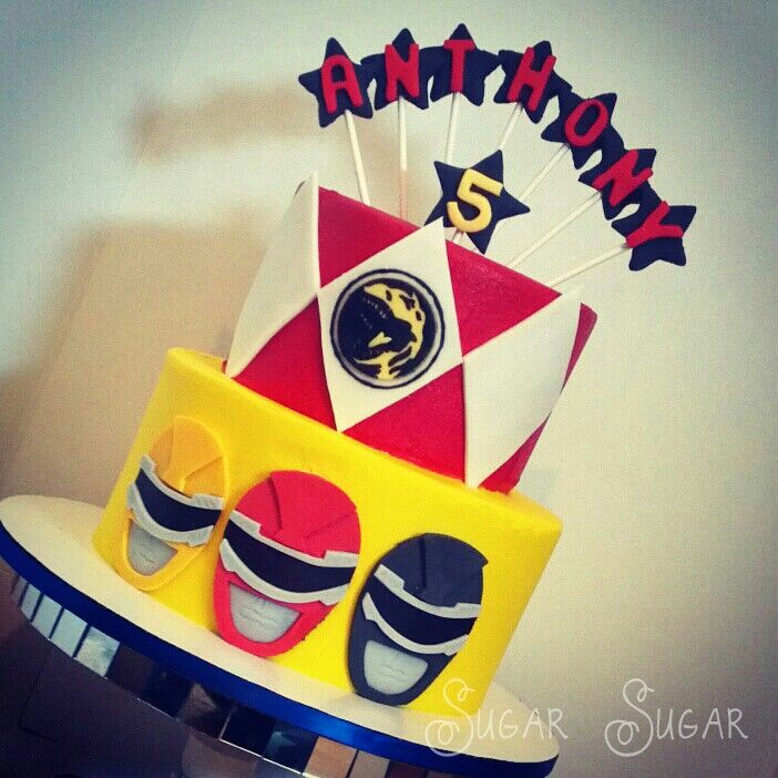 a birthday cake made to look like a clown's hat and eyeglasses