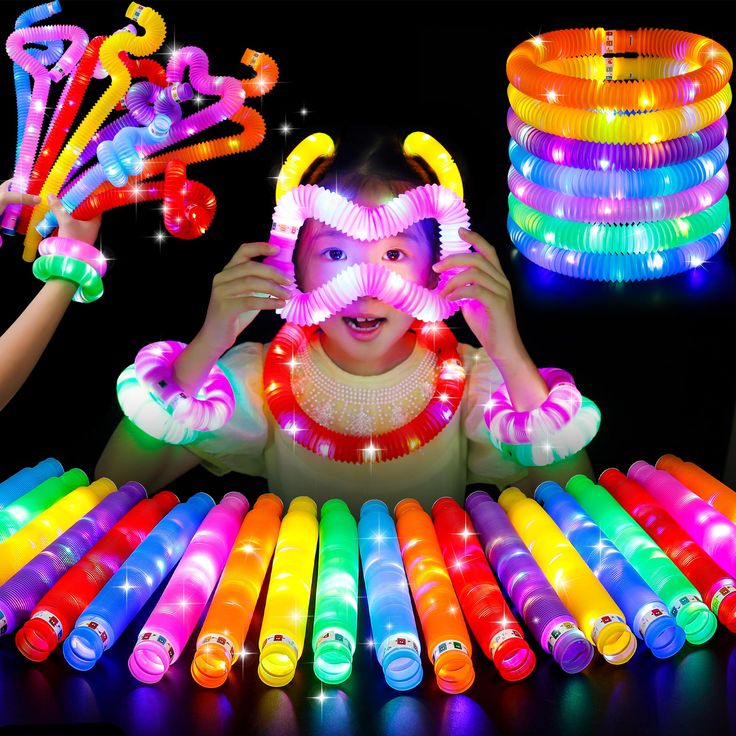 PRICES MAY VARY. 𝗨𝗻𝗶𝗾𝘂𝗲 𝗟𝗶𝗴𝗵𝘁 𝗨𝗽 𝗣𝗼𝗽 𝗧𝘂𝗯𝗲𝘀: 25 Pack UrChoice Light Up Pop Tubes comes in an assortment of 12 vibrant colors(red, orange, yellow, green, blue, purple, pink, deep blue). offering an array of choices for your glow parties, camping games, and movie night supplies needs. 𝗙𝘂𝗻 𝗣𝗮𝗿𝘁𝘆 𝗙𝗮𝘃𝗼𝗿𝘀: Ideal as Halloween party supplies, bag stuffers for birthday parties, wedding parties,and dance parties, these tubes add an extra glow to your events, ensuring they Dark Party Decorations, Dance Party Decorations, Pop Tube, Neon Party Supplies, Glow Stick Party, Glow In The Dark Party, Bulk Party Favors, Sound Production, Birthday Return Gifts