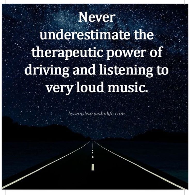 a road with the words never underestimate the the therapeuti power of driving and listening to very loud music