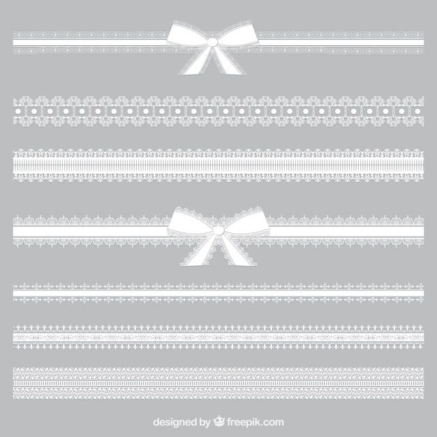 a set of white lace borders with bows