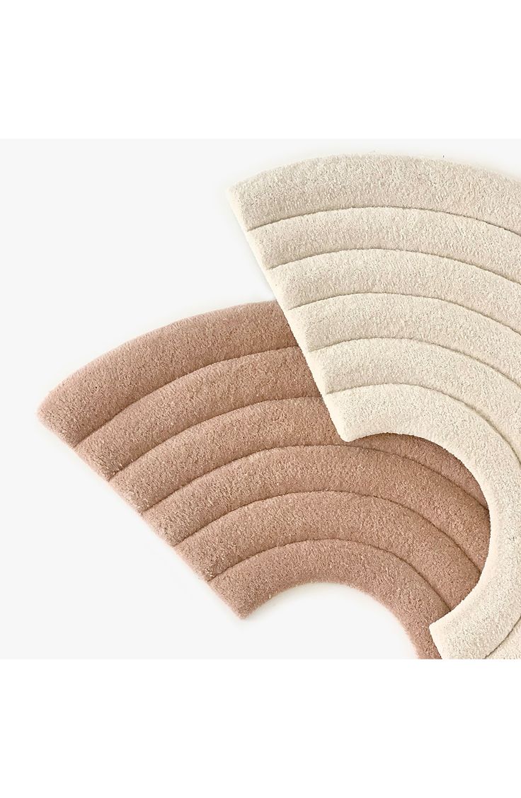 five pieces of beige felt on top of each other